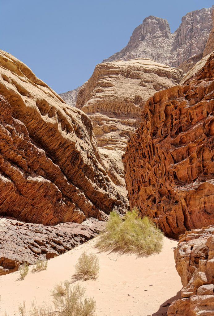 Top 10 Destinations - Breathtaking Ones to Visit in 2026 8 top 10 destinations Top 10 destinations - Wadi Rum desert Jordan red sandstone cliffs and starlit Bedouin camp