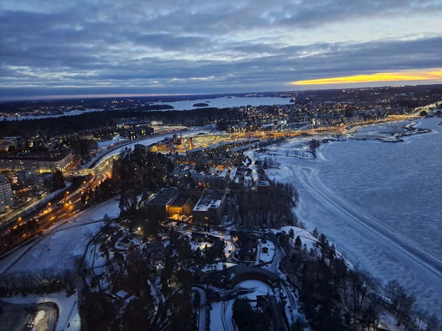 Top 10 Destinations - Breathtaking Ones to Visit in 2026 4 top 10 destinations Top 10 destinations - Oulu Finland city by the sea with Northern Lights in winter sky